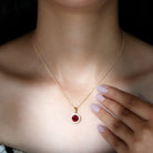 Rosec Jewels-Created Ruby and Moissanite Classic Halo Pendant