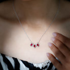 Three Pear Cut Created Ruby and Moissanite Halo Leaf Necklace in Silver - Rosec Jewels